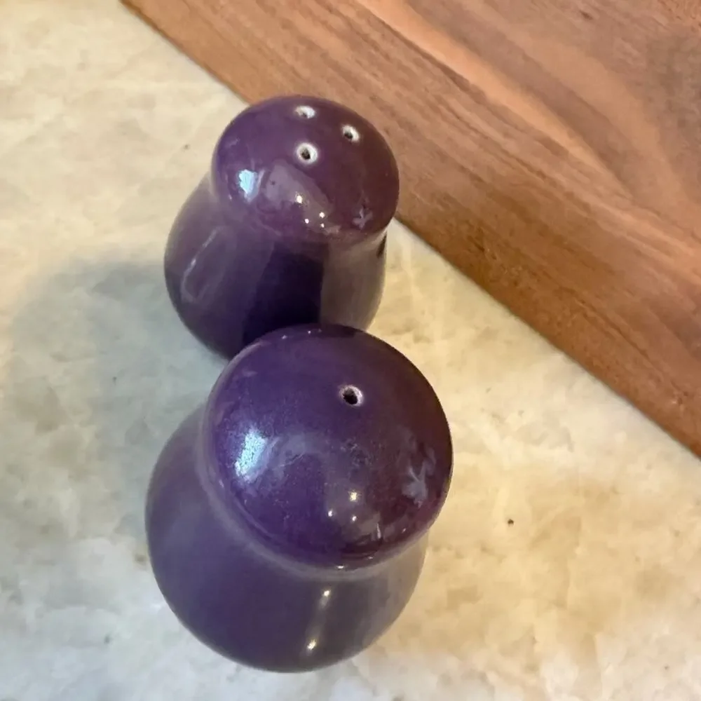 Vintage purple salt and pepper shakers